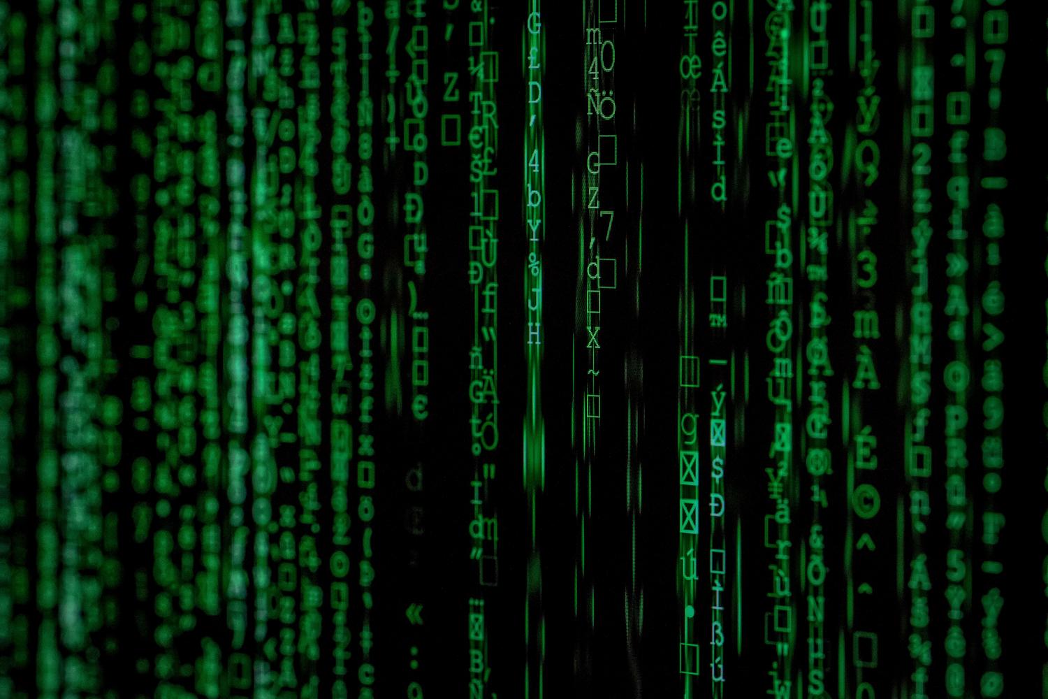 Fondo abstracto de código de matriz verde, representando la naturaleza digital y algorítmica de Jev AI. Fondo abstracto de código de matriz verde, representando la naturaleza digital y algorítmica de Jev AI.
