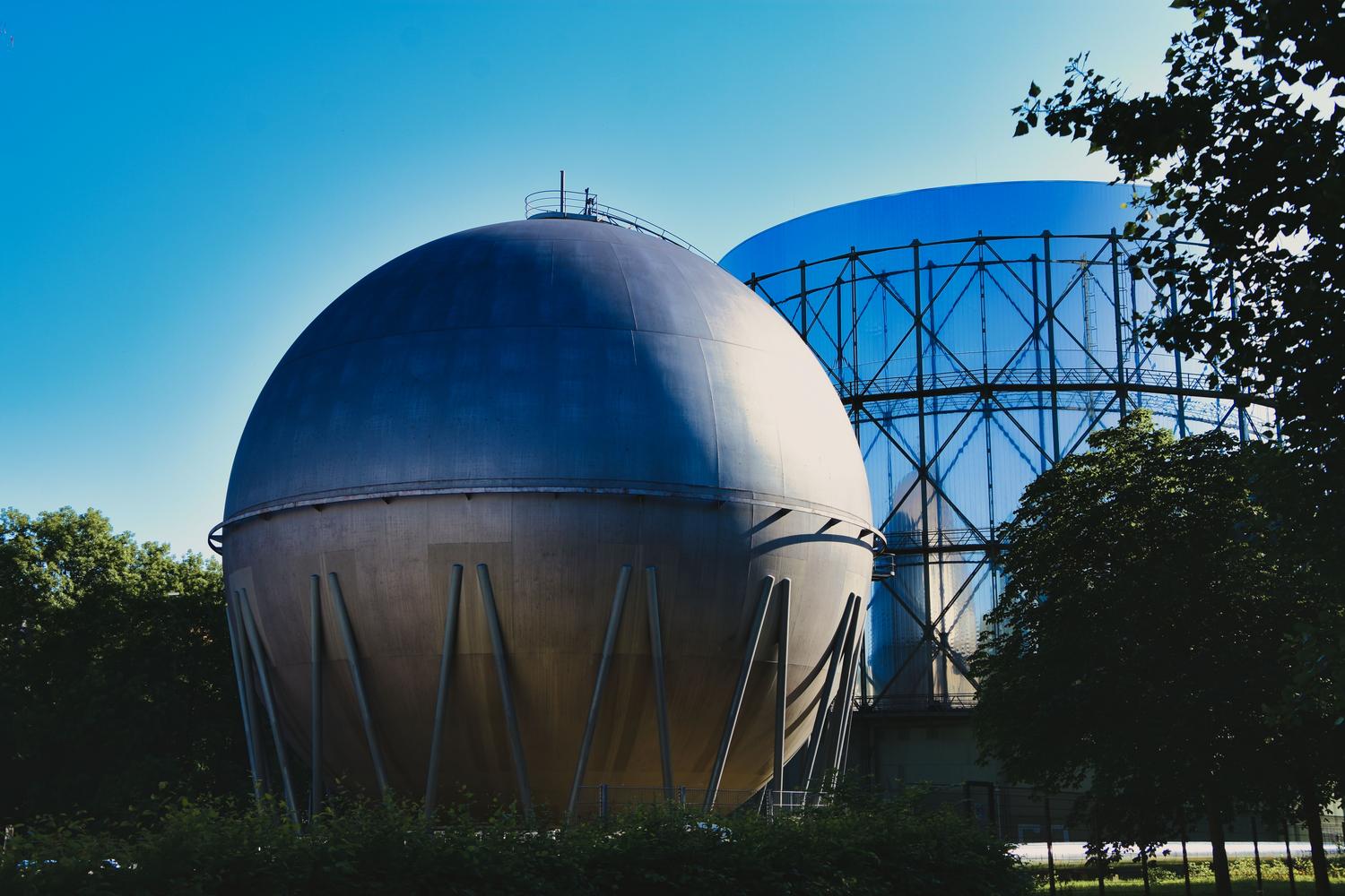 Industrial gasometers and large-scale storage tanks are essential for managing the biomethane produced. Industrial gasometers and large-scale storage tanks are essential for managing the biomethane produced.